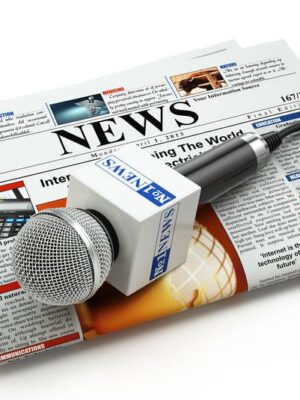 Newspaper and microphone representing content marketing