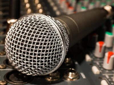 Microphone illustrating interviewing executive thought leaders for their perspectives. 